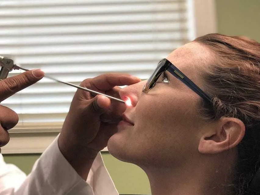 In-office nasal procedure being performed on a patient